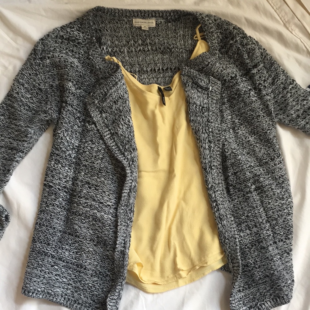 Black and white sweater with yellow tank top
